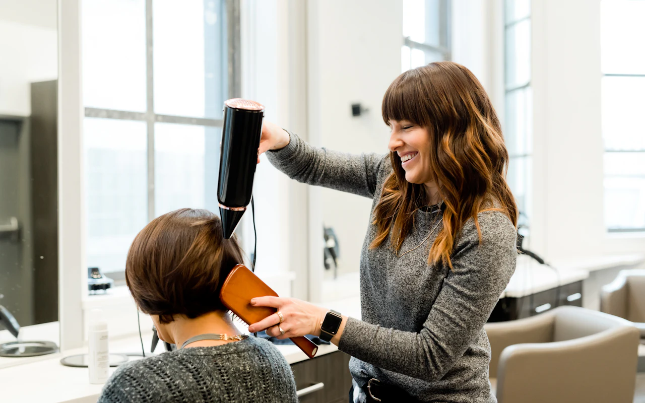 Illustrative photo of a short cut being blow-dried